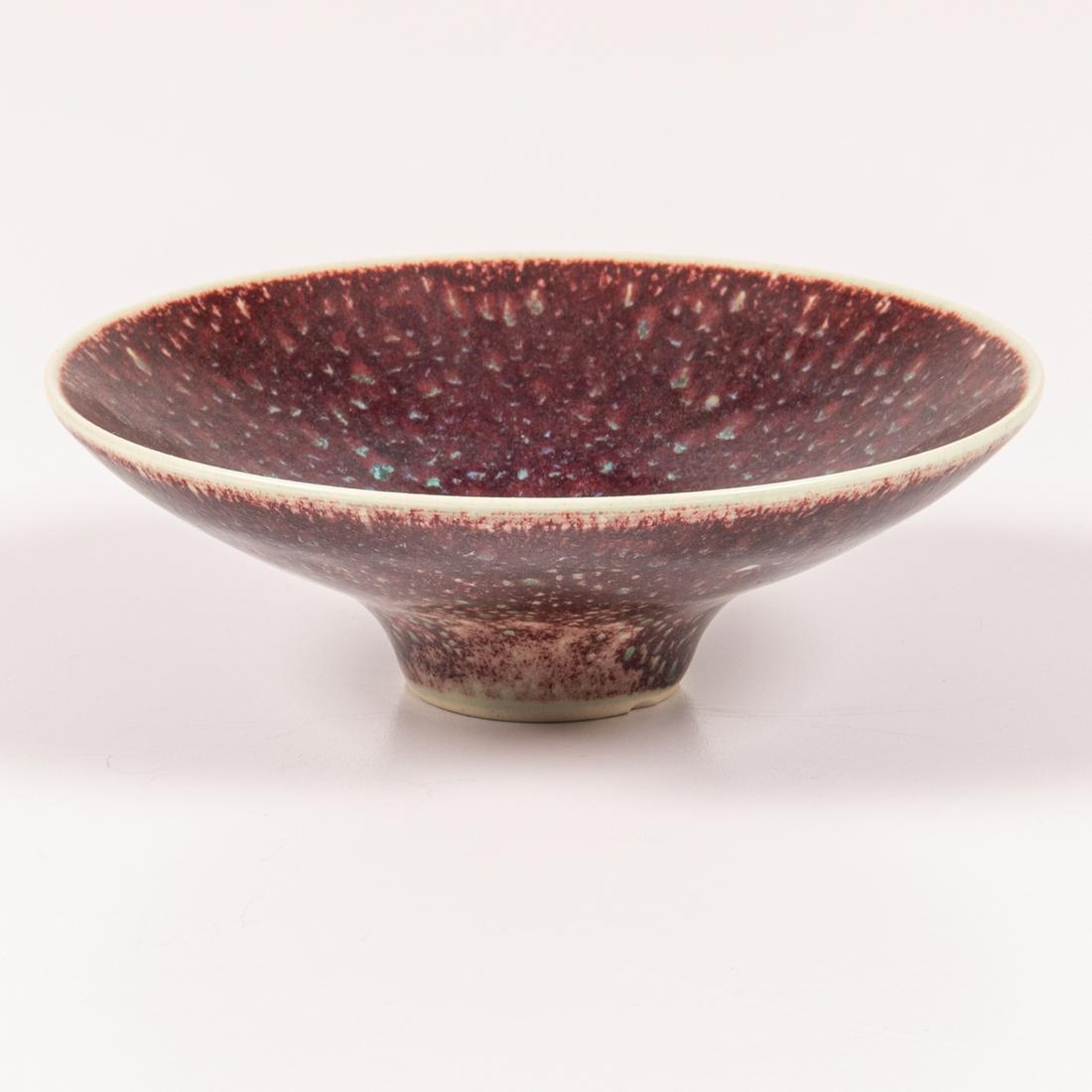 Sven Hofverberg, Porcelain Sang de Boeuf Glazed Bowl: A Sven Hofverberg (Sweden, 1923-1998) Porcelain Sang de Boeuf Glazed Bowl, 20th Century, Signed on base. H: 1 3/4 D: 5 3/4 in.