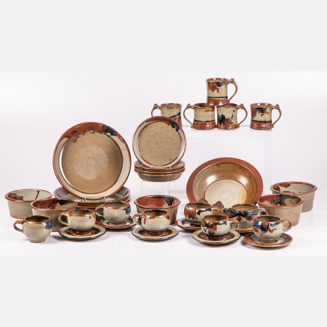 A Thirty Four Piece Partial Collection of John Glick (1 of 7)