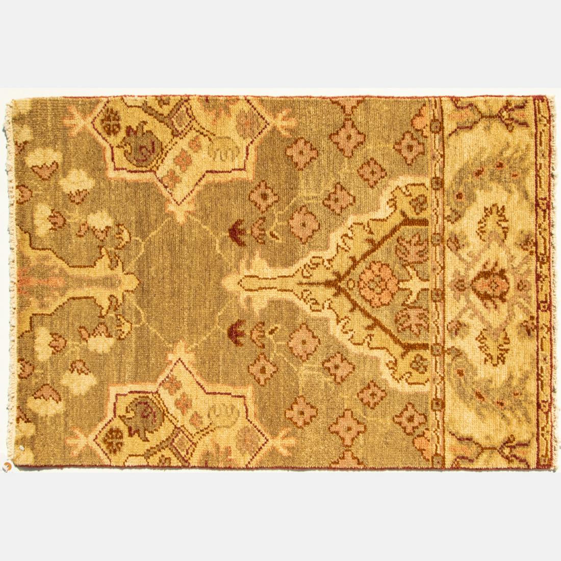 An Indo Turkish Oushak Rug, 21st Century. (1 of 3)