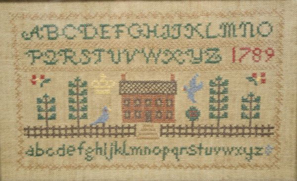 An Embroidered Reproduction Sampler, dated 1789, wi: An Embroidered Reproduction Sampler, dated 1789, with Alphabet, House, and Wildlife, Unsigned and dated. Height: 7 Width: 11 Depth: