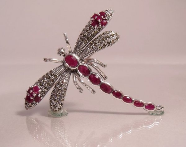 A Sterling Silver, Ruby and Marcasite Dragonfly Br: A Sterling Silver, Ruby and Marcasite Dragonfly Brooch, Marked 925. Height: Width: Depth: