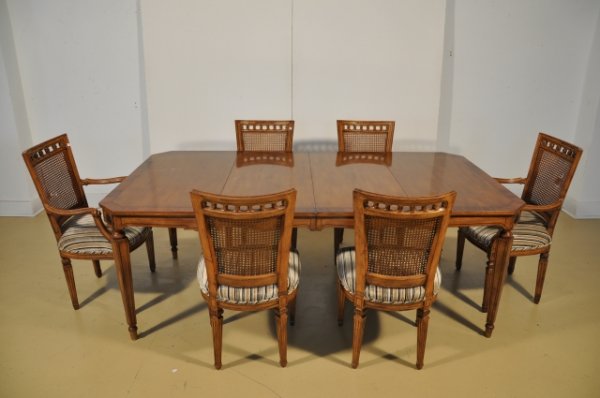 A Louis XV Style Mahogany Dining Room Set,: A Louis XV Style Mahogany Dining Room Set, Comprising of dining table with 6 chairs and two leaves. Table fully extended: h: 29 x w: 81 x d: 44 in. Note Condition: Surface wear and scratches through o
