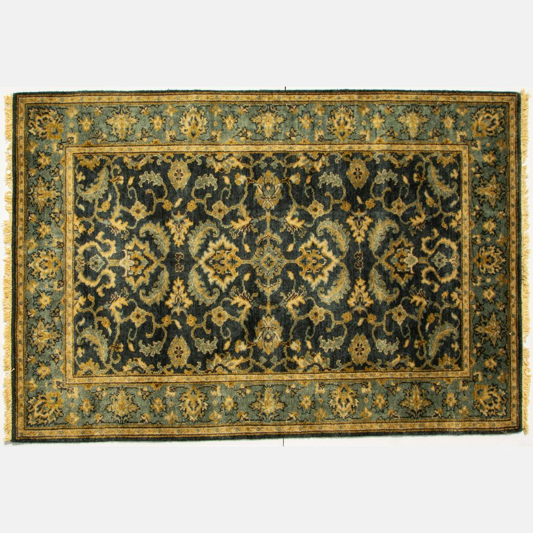 An Indo Persian Tabriz Wool Rug, 21st Century. (1 of 4)