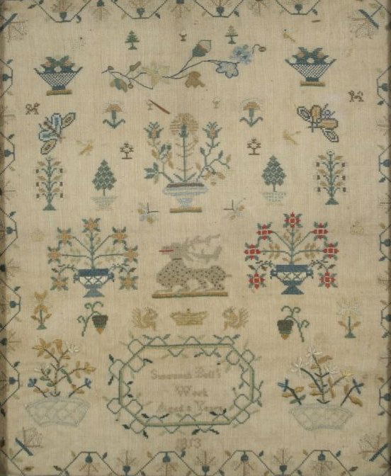 An Embroidered Sampler, dated 1813, by Susannah Bul: An Embroidered Sampler, dated 1813, by Susannah Bull, with animals and plant life, inscribed ""Susannah Bull's Work, Aged 8 Years, 1813"" Note Condition: Cotton yellowing with age, stains and fading.