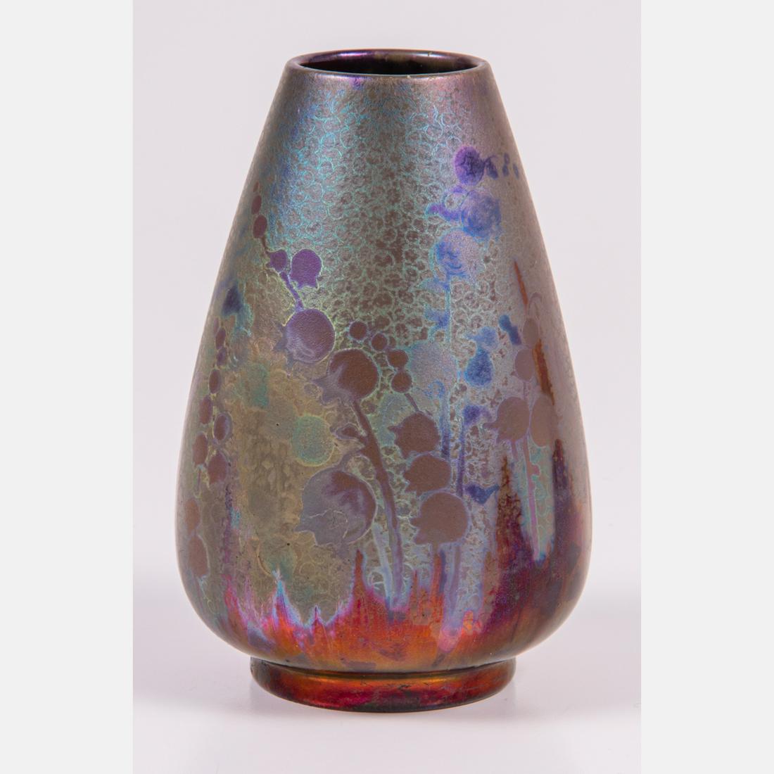 A Clement Massier (1844-1917) Vase,: A Clement Massier (1844-1917) Vase, Design by Lucien Levy-Dhurmer (1865-1953). With iridescent metallic glaze depicting bluebell flower. Signed C.M. Golfe-Juan A.M. Also with impressed marks. H: 5 1/8