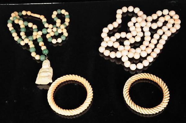 A Pink Coral Beaded Necklace, together with an Ivo: A Pink Coral Beaded Necklace, together with an Ivory and Jade Necklace, and 2 Ivory Bracelets,