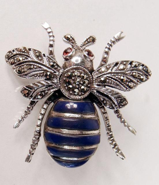 A Sterling Silver, Garnet, Lapis and Marcasite Bee: A Sterling Silver, Garnet, Lapis and Marcasite Bee Form Brooch. Stamped 925