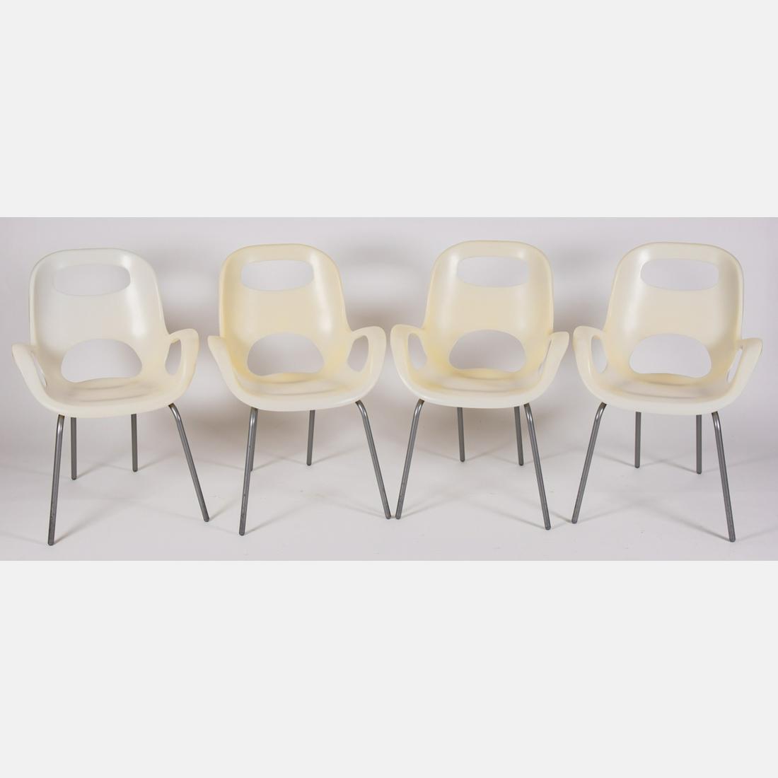 A Set of Four Karim Rashid Oh Molded Plastic Arm Chairs (1 of 4)