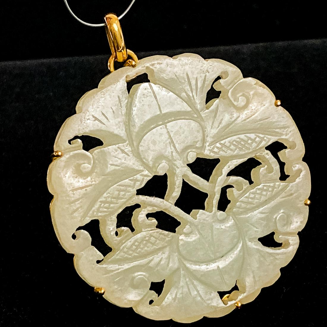 An 18kt Yellow Gold and Jade Pendant and Brooch: An 18kt Yellow Gold and Jade Pendant and Brooch, Marked CB750. Dia: 2 in. Please note no credit card payments for first time buyers and seven business day hold on all checks.