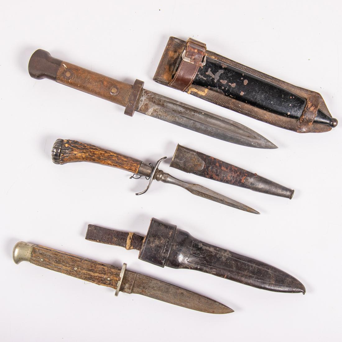 A Collection of Six Continental Hunting Knives, Axe, (1 of 4)