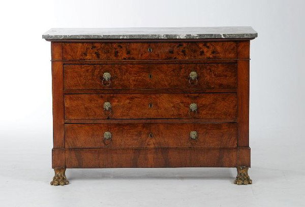 A Biedermeier Style Curly Maple Marble-Top Chest of: A Biedermeier Style Curly Maple Marble-Top Chest of Drawers, 19th Century, with a gray marble top, above four long drawers with brass lion head pulls, raised on two gilt metal lion paw feet. Note Cond