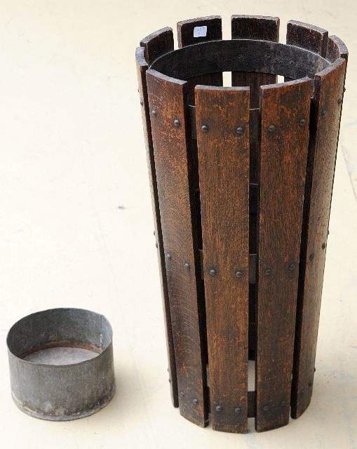 A Gustav Stickley Slatted Umbrella Stand, 19th/20th: A Gustav Stickley Slatted Umbrella Stand, 19th/20th Century, Stand #100, riveted rings with zinc and wood pan. Note condition: Unmarked, refinished with surface wear and scratches. Wear to upper and l