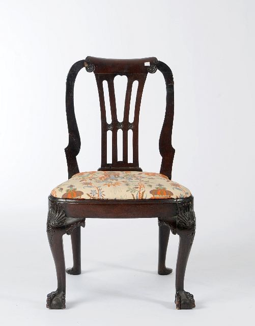 A George II Style Mahogany Side Chair, 19th Century: A George II Style Mahogany Side Chair, 19th Century, with an open back, pierced vertical splats and rosettes, over a curved seat rail on cabriole legs with claw and ball feet, 19th Century.Note Condit