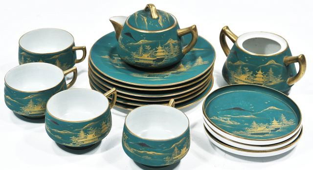 A Japanese Green and Gilt Tea Set,: A Japanese Green and Gilt Tea Set, consisting of 1 teapot, 1 creamer, 1 sugar, 4 tea cups, 3 saucers, 6 plates. Note Condition: Sugar missing lid Teapot Height: 5 in. Height: Width: Depth: