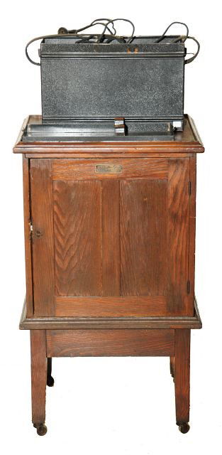 A Keystone View Company Glass Slide Collection: A Keystone View Company Glass Slide Collection in an Oak Cabinet together with a Bausch and Lomb Optical Slide Projector. Cabinet: height: 35.5 x length: 21 x width: 17.5 in. Height: Width: Depth:
