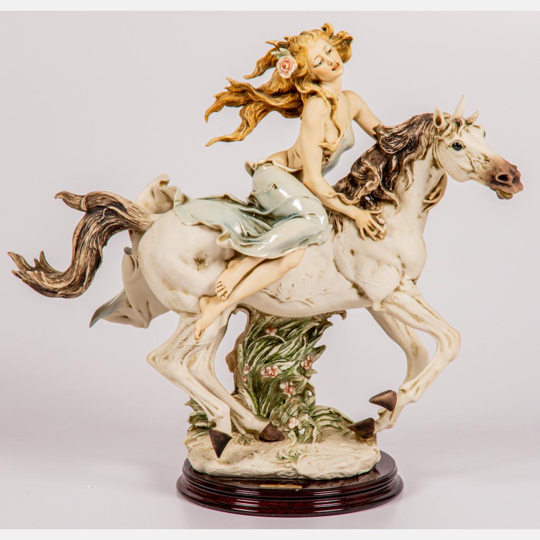 Liberty by Giuseppe Armani: A Giuseppe Armani (Italian, 1935-2006) Florence Sculpture d’Arte Woman on Horse, 1992, Signature on front base. Together with original box. Medium: Cold-cast porcelain Edition 2521/5000. H: 15 W