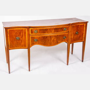 Federal Style Mahogany and Walnut Sideboard by Landstrom Furniture Co.: A Federal Style Mahogany and Walnut Sideboard by Landstrom Furniture Co., Rockford, Illinois, 20th Century. H: 37 W: 67 D: 24 1/2 in.