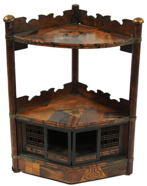 A Japanese Diminutive 2 Tier Corner Stand,: A Japanese Diminutive 2 Tier Corner Stand, Meiji period with elm, oak and rosewood marquetry decoration. Provenance: Generously donated by Betsy Fallon. Proceeds to benefit the Cleveland Play House. H