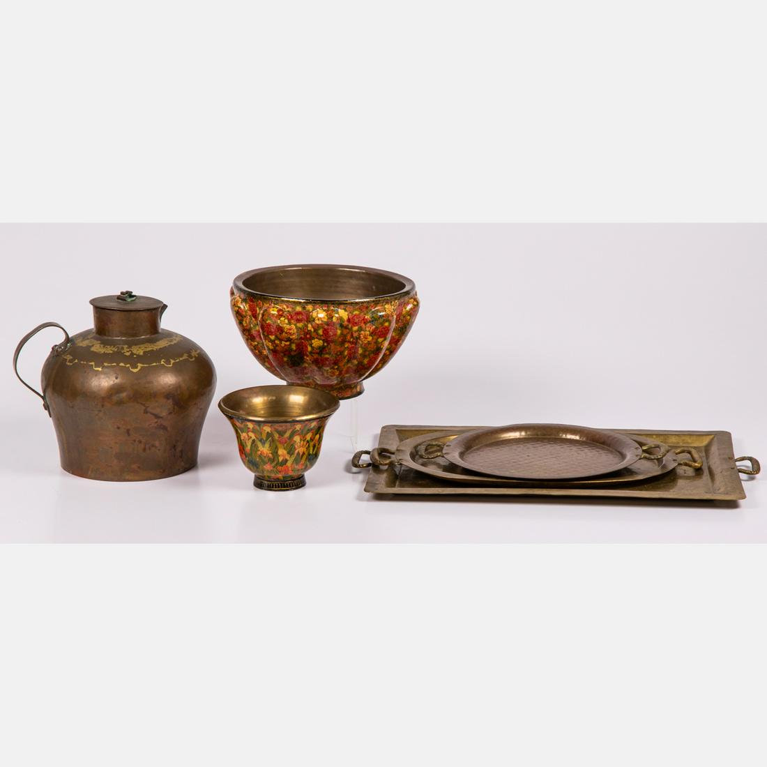A Group of Brass and Copper Decorative Objects: A Group of Brass and Copper Decorative Objects, 19th and 20th Century, Comprising of a brass and copper pitcher, three brass trays with handles and two Kashmiri paper mache brass lined bowls. Brass pi