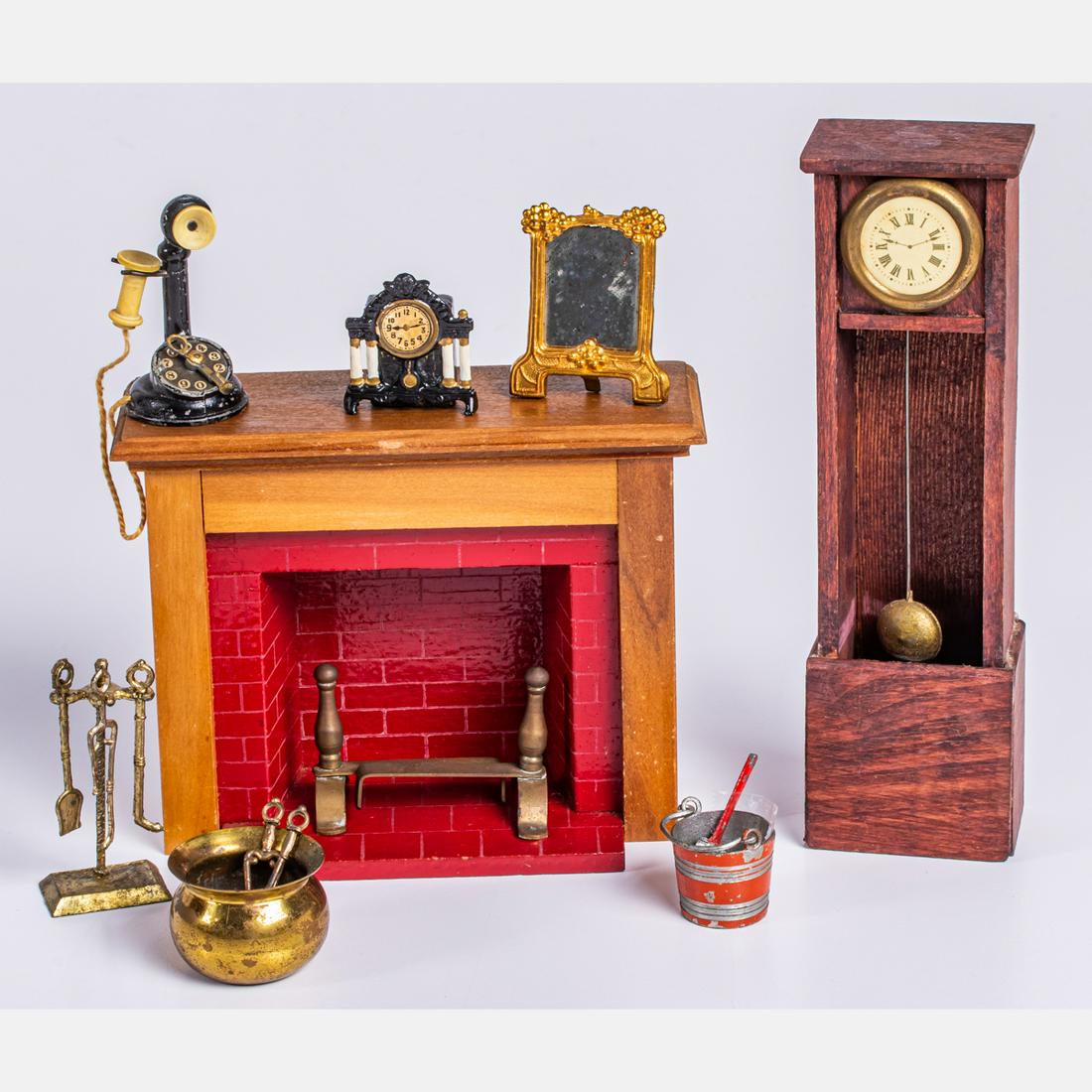 German Dollhouse Furniture and Decorative Objects: A Group of German Dollhouse Furniture and Decorative Objects, 20th Century, Comprising of a wood painted fireplace, a floor standing grandfather clock with metal swinging pendulum marked Germany on th