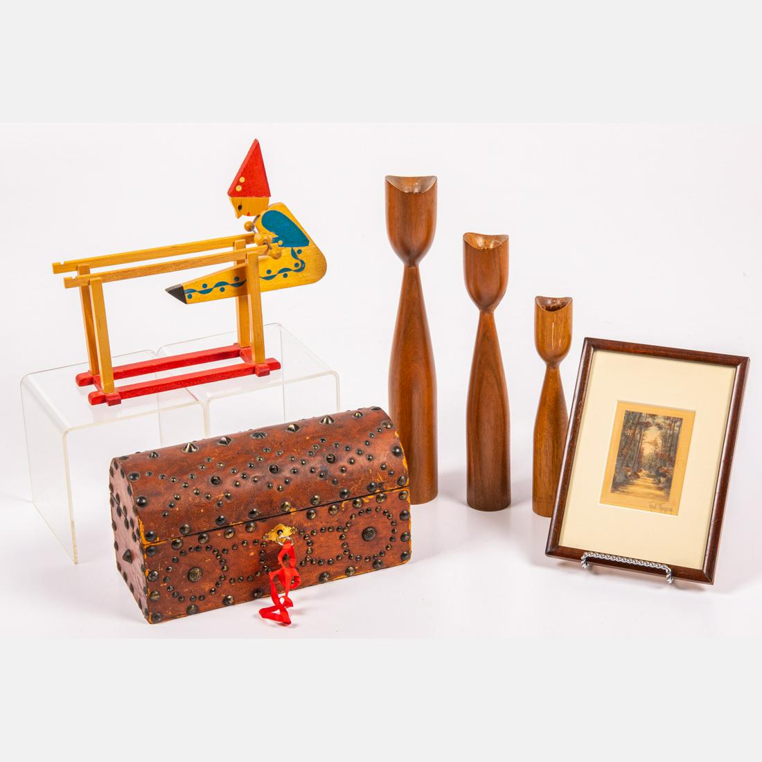 Collection of German and Danish Decorative Objects: A Collection of German and Danish Decorative Objects, Comprising of an East German Erzgebirge painted wood perpetual motion gymnast toy, three Danish walnut candlesticks, a leather studded trinket box