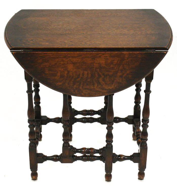 A Diminutive William & Mary Style Turned Oak Gatele: A Diminutive William & Mary Style Turned Oak Gateleg Table, 19th Century, HEIGHT: 25 WIDTH: 31 DEPTH: 25