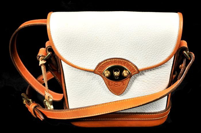 A Dooney & Burke All Weather Leather Purse,: A Dooney & Burke All Weather Leather Purse, HEIGHT: 7 WIDTH: 7 DEPTH: 2
