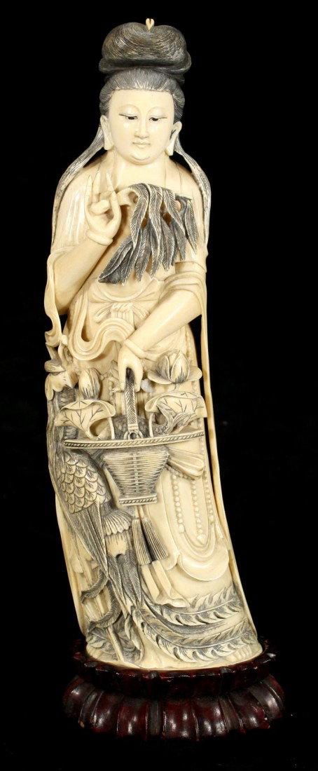 A Chinese Carved Ivory Standing Figure of Guanyin,