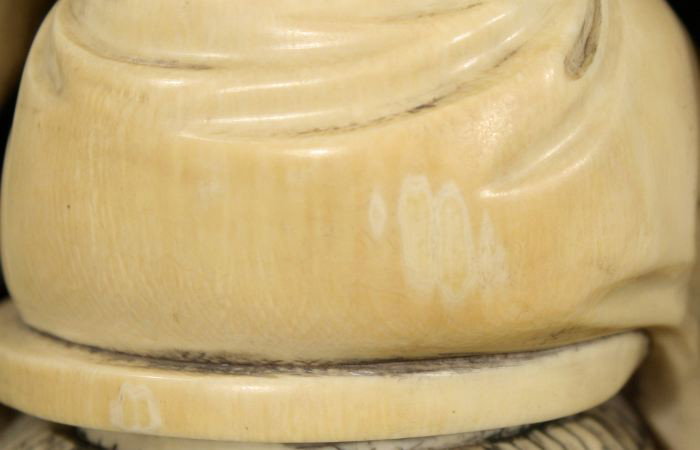 A Chinese Carved Ivory Figure of a Seated Guanyin, - 4