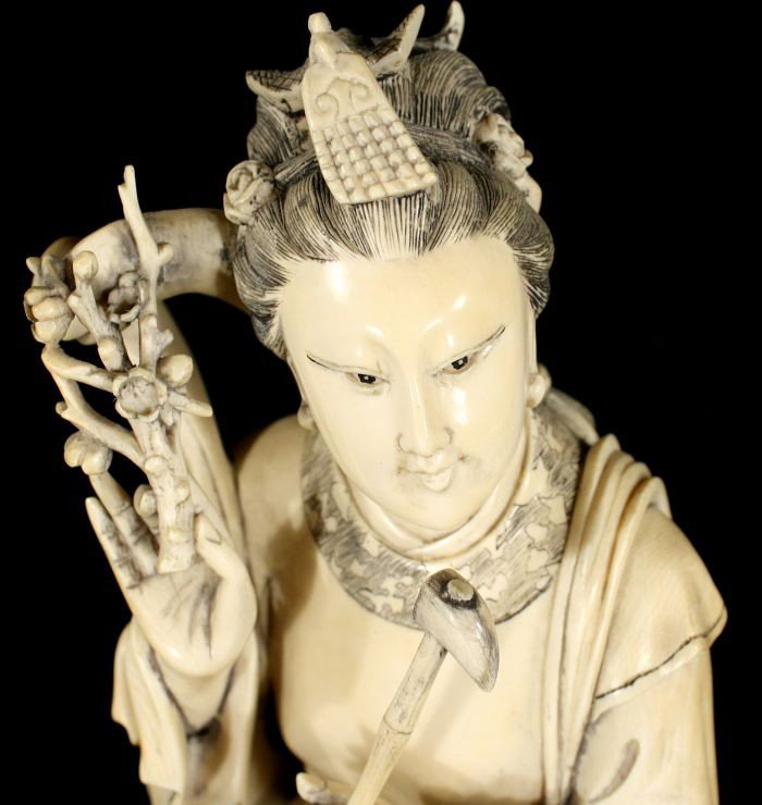 A Chinese Carved Ivory Figure of a Seated Guanyin, - 8