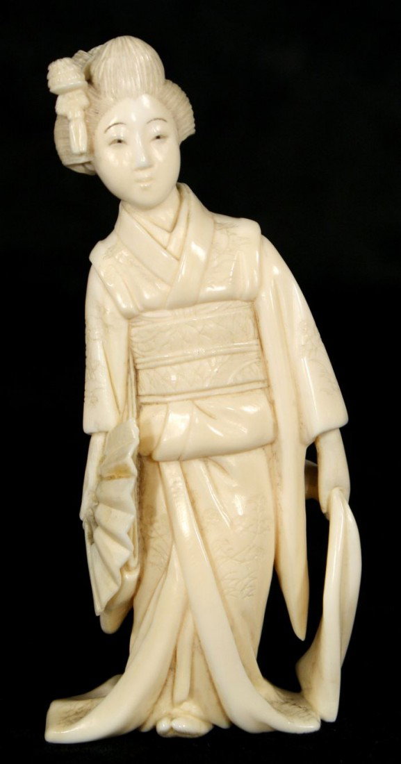 A Japanese Carved Ivory Figure of a Geisha, Early 2