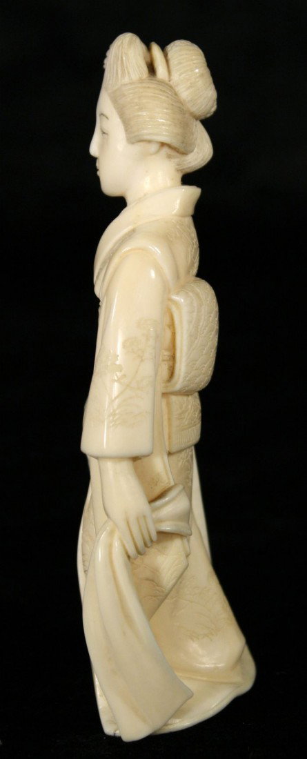 A Japanese Carved Ivory Figure of a Geisha, Early 2 - 3