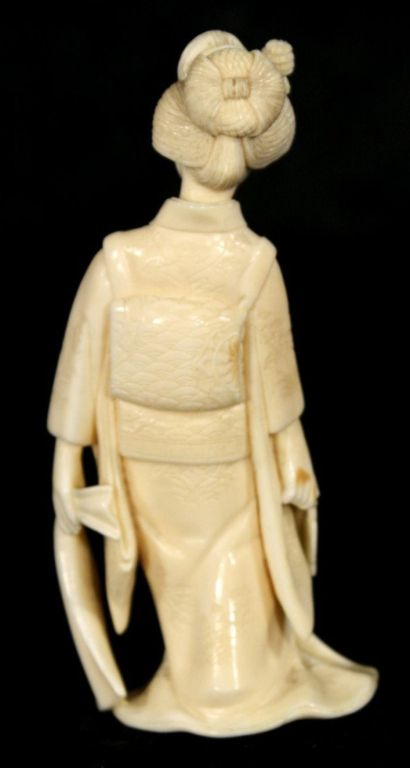 A Japanese Carved Ivory Figure of a Geisha, Early 2 - 4