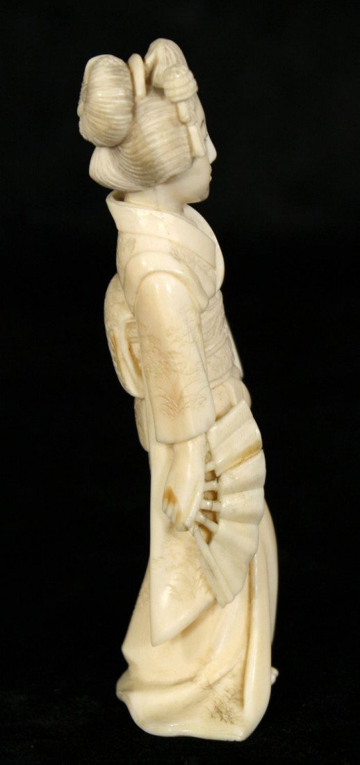 A Japanese Carved Ivory Figure of a Geisha, Early 2 - 5