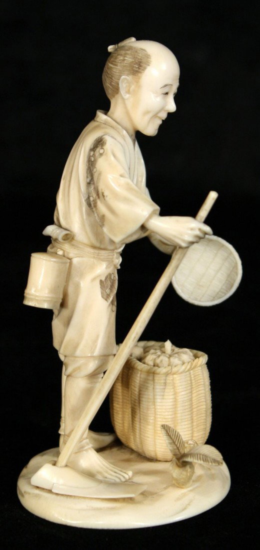 A Japanese Carved Ivory Figure of a Peasant Farmer, - 4