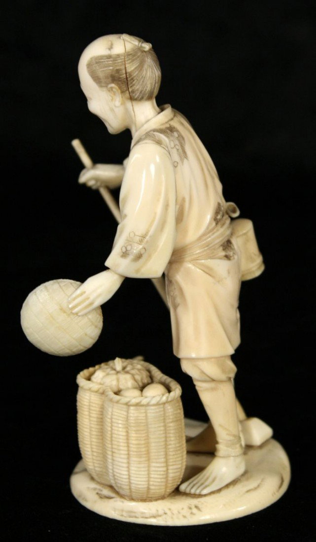 A Japanese Carved Ivory Figure of a Peasant Farmer, - 5