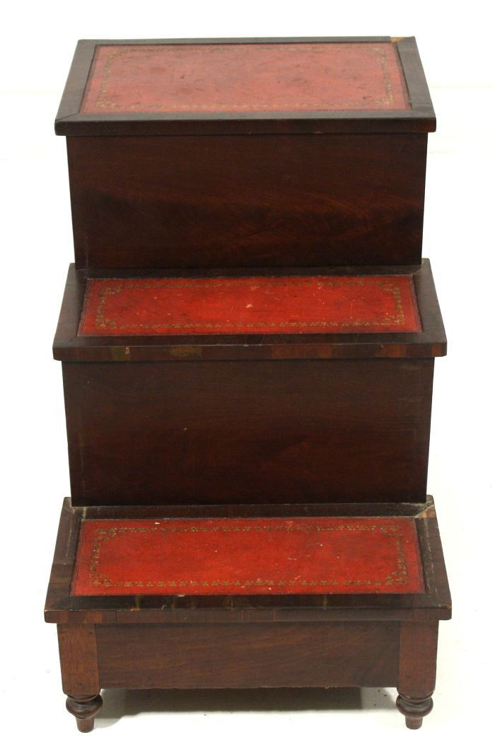 A Georgian Style Mahogany and Leather Transforming: A Georgian Style Mahogany and Leather Transforming Library Step with Slide-Out Compartment, 19th Century. h: 27.75 x w: 20 x d: 29 in.