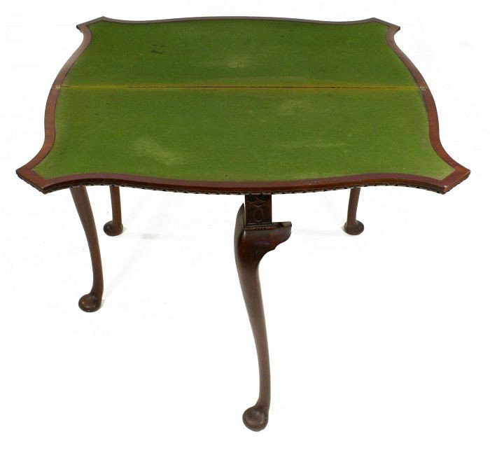 An American Flame Mahogany Games Table, 19th Centu: An American Flame Mahogany Games Table, 19th Century. h: 28 x w: 36 x d: 36 in.