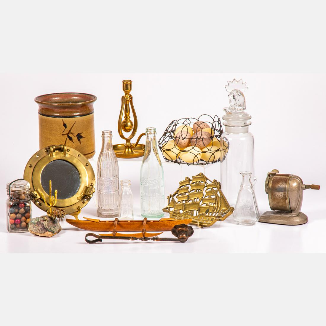 Pressed Glass, Brass and Ceramic Decorative Objects: A Collection of Pressed Glass, Brass and Ceramic Decorative Objects, 20th Century, Including a Heisey glass rooster cocktail shaker, a vintage Coca Cola Key West bottle, ceramic marbles,two antique bo
