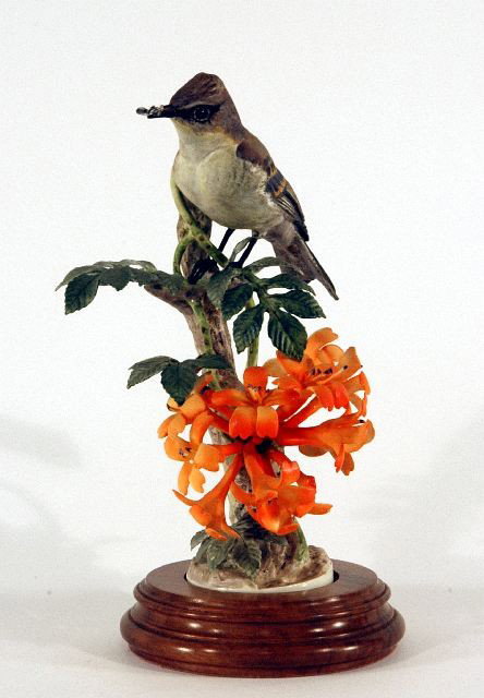 A Royal Worcester Dorothy Doughty Porcelain Phoebe: A Royal Worcester Dorothy Doughty Porcelain Phoebe Sayornis Pheobe Cock and Flame Vine, 20th Century. h: 10.75 x w: 6 in.