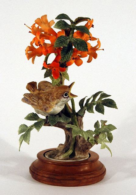 A Royal Worcester Dorothy Doughty Porcelain Phoebe: A Royal Worcester Dorothy Doughty Porcelain Phoebe Sayornis Phoebe Chick and Flame Vine, 20th Century. h: 10 x w: 5.50 in.