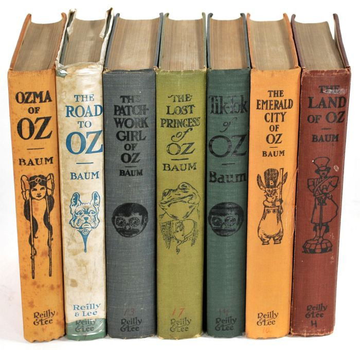 BAUM, L. Frank (1856-1919). A Group of Seven Oz Tit: BAUM, L. Frank (1856-1919). A Group of Seven Oz Titles. Reprinted by the Reilly & Lee Co., Chicago. Including The Road to Oz with original dust jacket. (All with some light wear.)