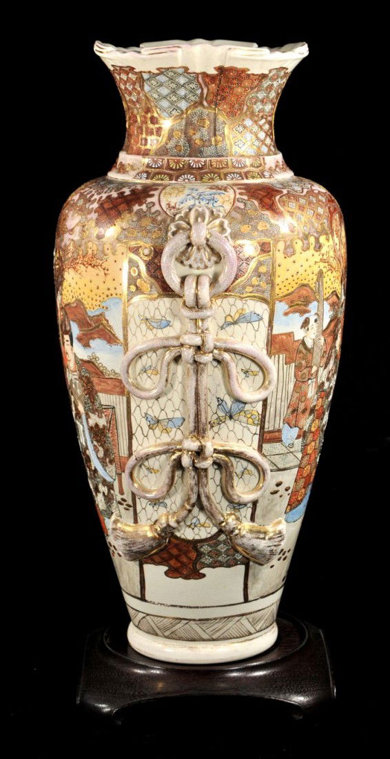 A Large Satsuma Earthenware Vase, 20th Century,: A Large Satsuma Earthenware Vase, 20th Century, Depicting figures in a landscape on a carved hardwood base. h: 24 x w: 13 in.