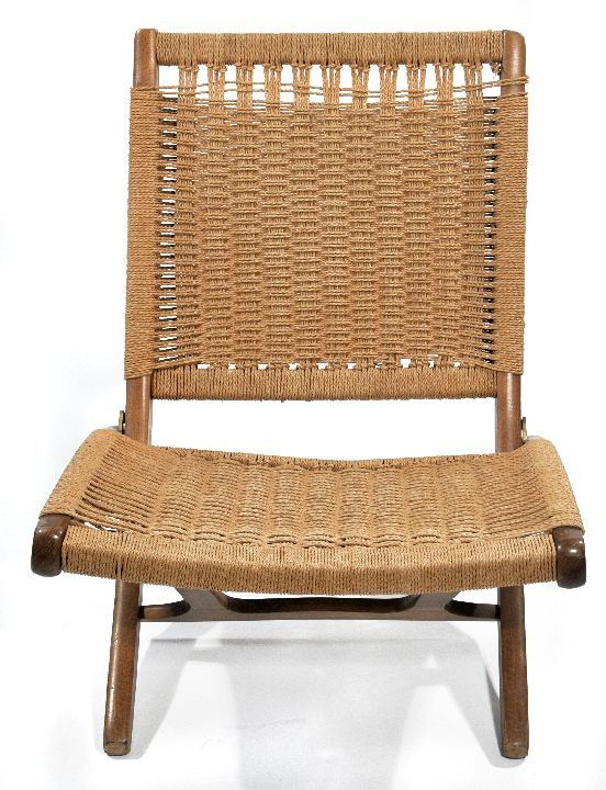 A Mid-Century Modern Folding Chair with Woven Rush: A Mid-Century Modern Folding Chair with Woven Rush Seat and Back, in the Style of Hans Wegner. h: 29 x w: 24 x d: 25.25 in.