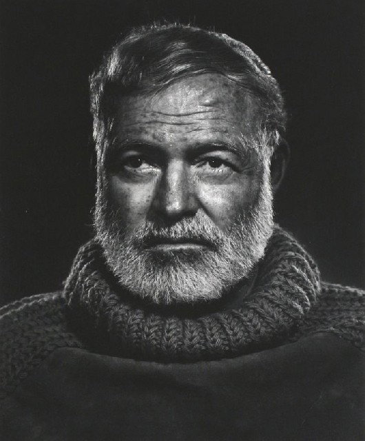 Yousuf Karsh (Canadian, 1908-2002): Yousuf Karsh (Canadian, 1908-2002) Ernest Hemingway, Gelatin silver print, Signed in ink on mount lower left. Photo attached to mat with mounting tape. Title, date and inventory hand stamp on verso: '