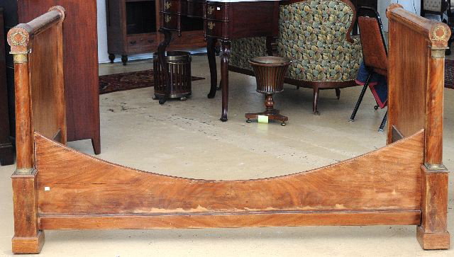 An Empire Style Mahogany and Gilt Brass Day Bed: An Empire Style Mahogany and Gilt Brass Day Bed, 20th Century. h: 41.75 x w: 80 x d: 43.75 in.