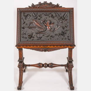 Folio Stand Attributed to Luigi Frullini: Attributed to Luigi Frullini (Italian, 1839-1897) An Ornately Carved Walnut Folio Stand in the Renaissance Style, 19th Century, The deeply carved clamshell arch with scrolling foliage of leaves and