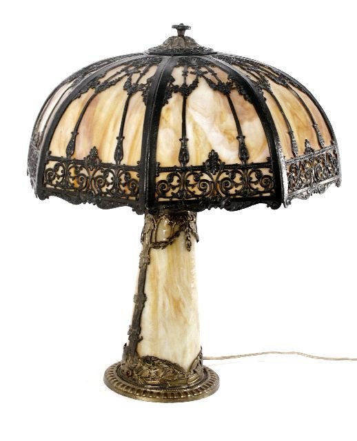 An American Slag Glass Table Lamp, Early 20th Cent: An American Slag Glass Table Lamp, Early 20th Century. In working order with illuminated base. h: 24 x w: 21 in.