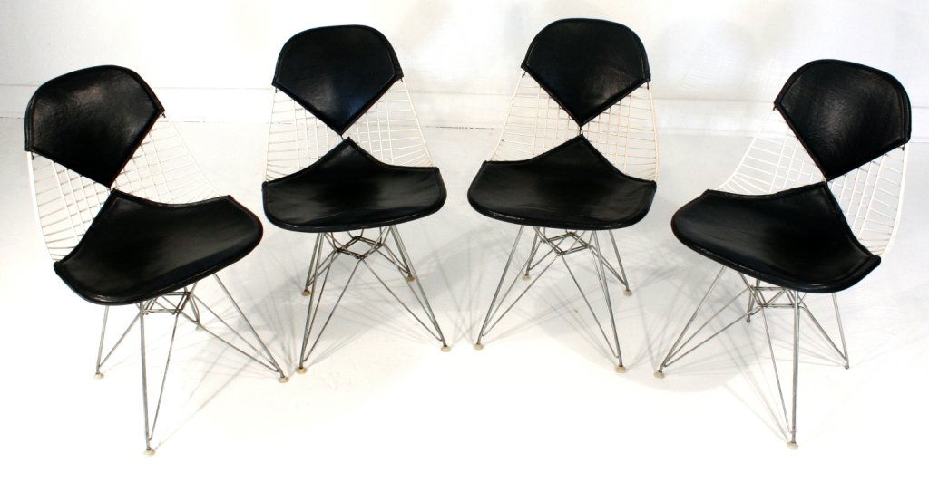 A Set of Four Charles and Ray Eames for Herman Mil: A Set of Four Charles and Ray Eames for Herman Miller Bikini Side Chairs on Eiffel Tower Bases. h: 32.50 x w: 19.25 x d: 19 in.