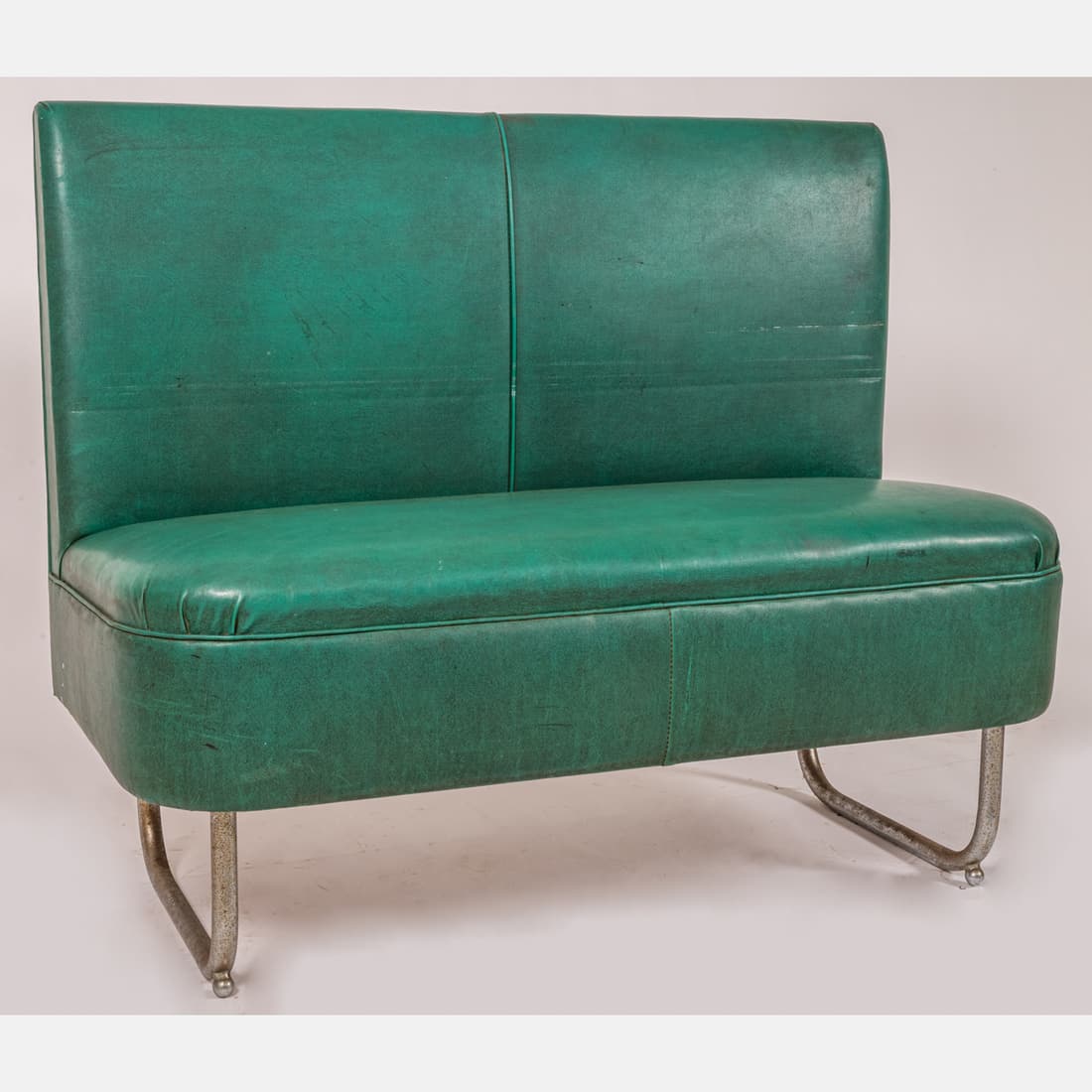 K.E.M. Weber Style Two Seat Tubular Chrome and Vinyl Settee: A K.E.M. Weber (1899-1963) Style Two Seat Tubular Chrome and Vinyl Settee, 20th Century. H: 35 W: 42 1/2 D: 21 in. From the Estate of Douglas W. Lucak The absence of a condition statement does not imp